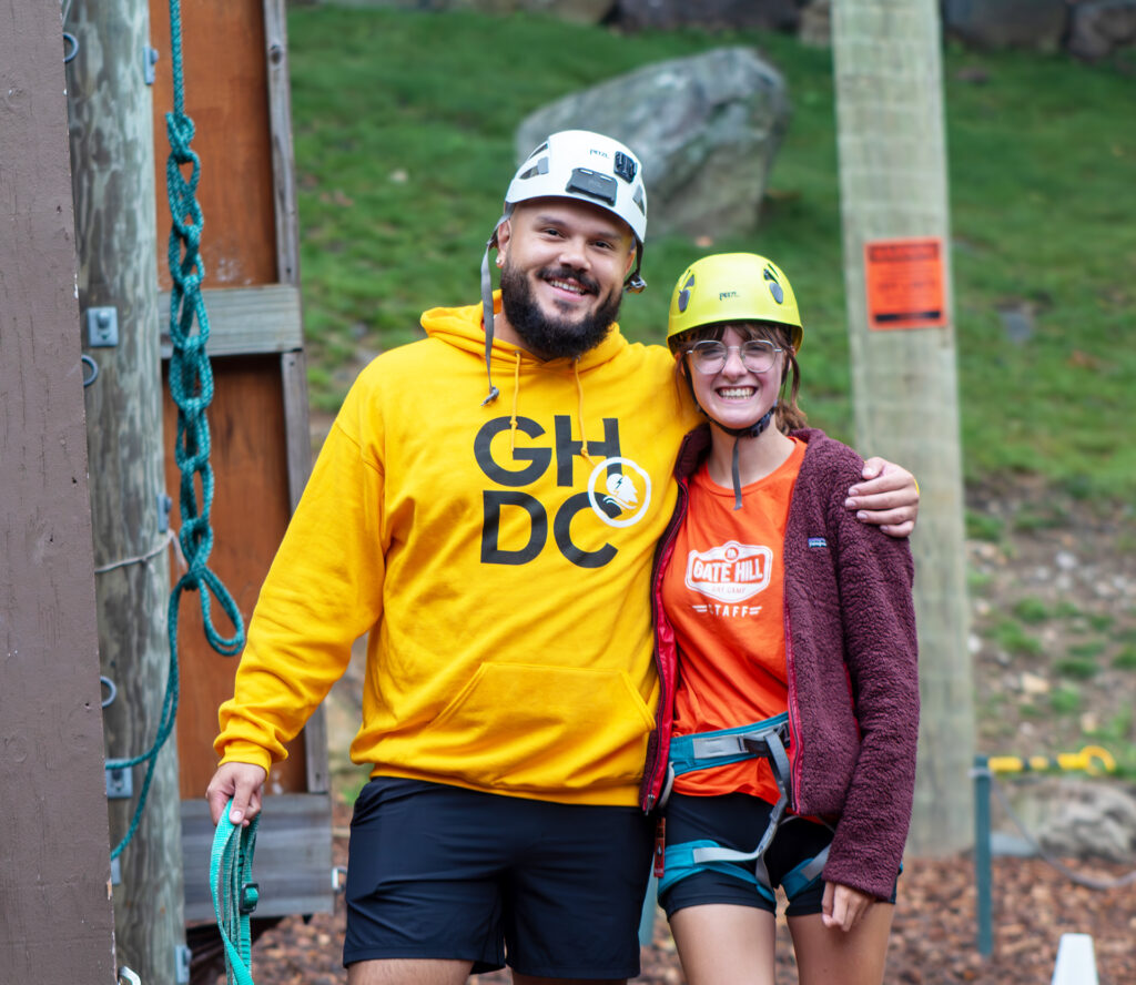 staff members rock climbing